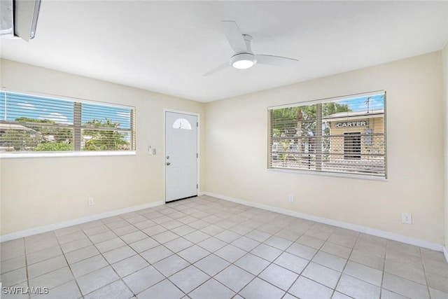527 Goodland Drive W, Goodland, FL 34140 - entrance foyer with ceiling fan and light tile patterned flooring