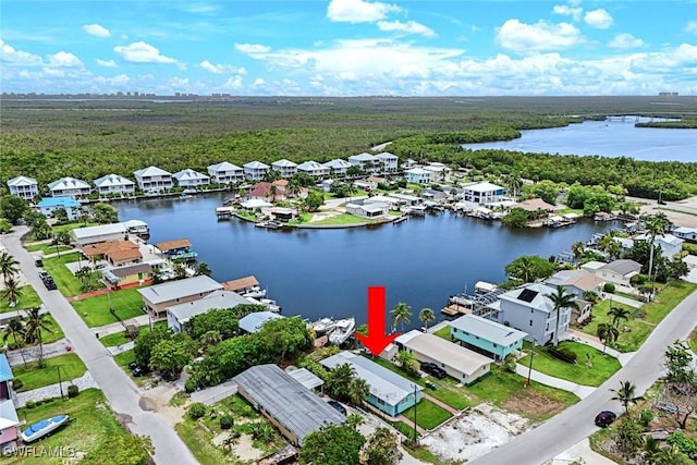 527 Goodland Drive W, Goodland, FL 34140 - aerial perspective of suburban area featuring a heavily wooded area and a nearby body of water