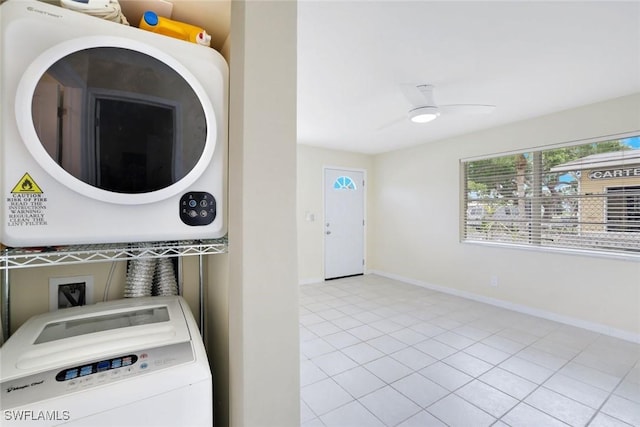 527 Goodland Drive W, Goodland, FL 34140 - laundry room with washer / dryer, light tile patterned flooring, and a ceiling fan