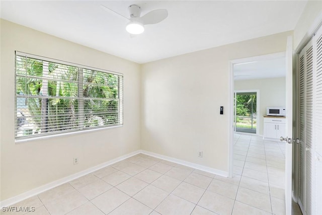527 Goodland Drive W, Goodland, FL 34140 - unfurnished room featuring light tile patterned floors and a ceiling fan