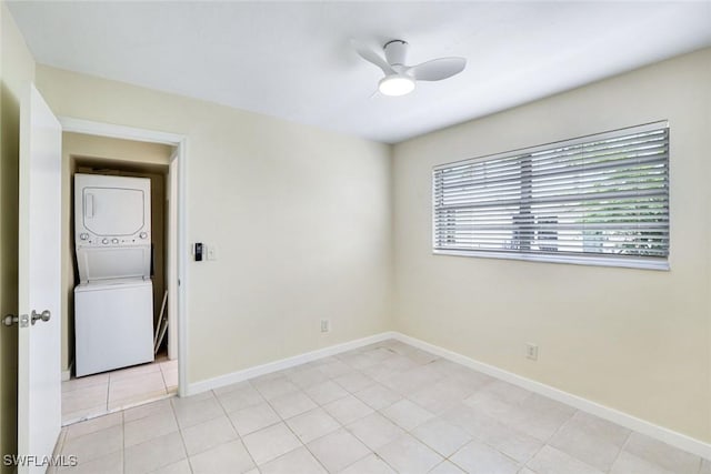 527 Goodland Drive W, Goodland, FL 34140 - spare room featuring stacked washer and clothes dryer, ceiling fan, and light tile patterned flooring