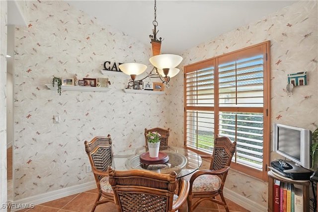 1381 Areca Cv, Naples, FL 34119 - tiled dining space with wallpapered walls