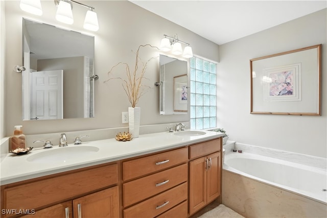 1381 Areca Cv, Naples, FL 34119 - full bath featuring double vanity and a garden tub