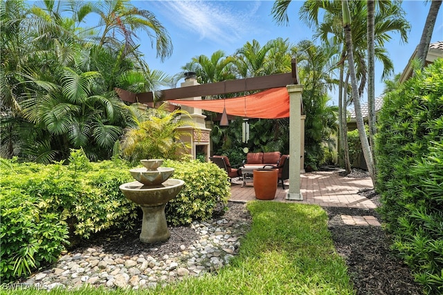 1381 Areca Cv, Naples, FL 34119 - view of yard with a patio and an outdoor hangout area