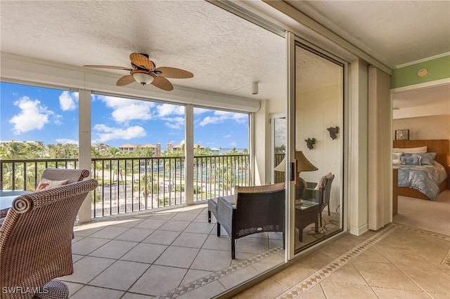 4745 Estero Blvd Unit 302, Fort Myers Beach, FL 33931 - sunroom / solarium featuring tile patterned flooring and ceiling fan