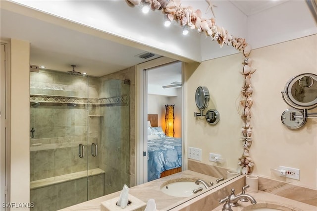 4745 Estero Blvd Unit 302, Fort Myers Beach, FL 33931 - bathroom featuring a shower stall, vanity, and connected bathroom