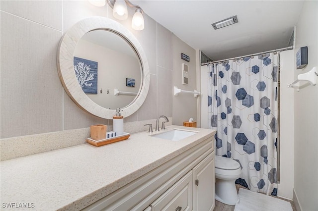 400 Lenell Rd Unit 207, Fort Myers Beach, FL 33931 - bathroom featuring vanity and a shower with curtain