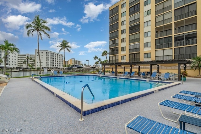400 Lenell Rd Unit 207, Fort Myers Beach, FL 33931 - community pool featuring a patio area