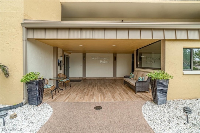 400 Lenell Rd Unit 207, Fort Myers Beach, FL 33931 - view of exterior entry featuring stucco siding