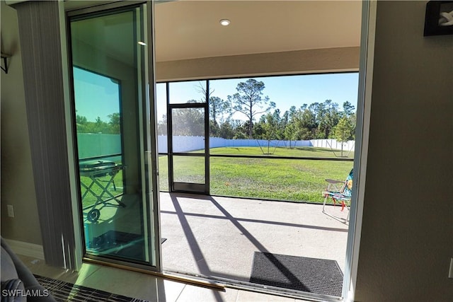 3393 Kacher Rd, North Port, FL 34288 - doorway to outside featuring recessed lighting and tile patterned flooring