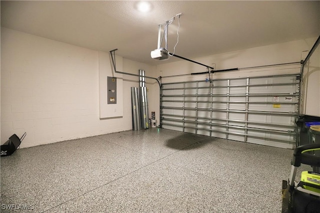 3393 Kacher Rd, North Port, FL 34288 - garage featuring a garage door opener and electric panel