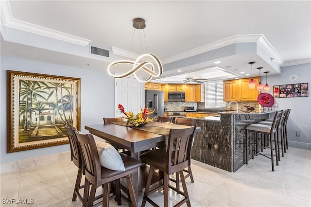 4745 Estero Blvd Unit 1002, Fort Myers Beach, FL 33931 - dining room with ornamental molding, a tray ceiling, ceiling fan, light marble finish flooring, and recessed lighting