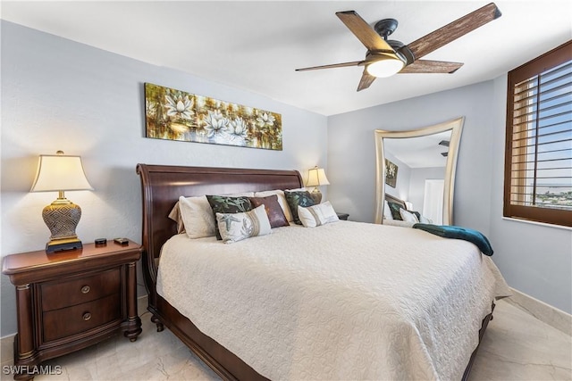 4745 Estero Blvd Unit 1002, Fort Myers Beach, FL 33931 - bedroom featuring light marble finish flooring, multiple windows, and ceiling fan