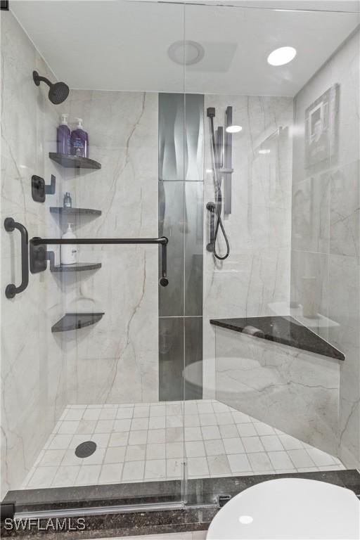 4745 Estero Blvd Unit 1002, Fort Myers Beach, FL 33931 - full bath featuring toilet and a marble finish shower