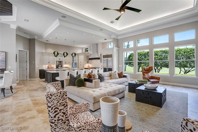 12850 Terabella Way, Fort Myers, FL 33912 - living area featuring ornamental molding, light tile patterned floors, a high ceiling, a ceiling fan, and recessed lighting