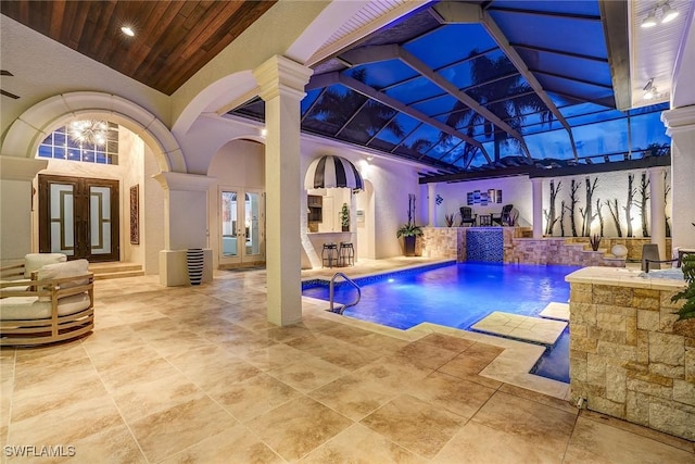 12850 Terabella Way, Fort Myers, FL 33912 - outdoor pool featuring french doors and a patio area