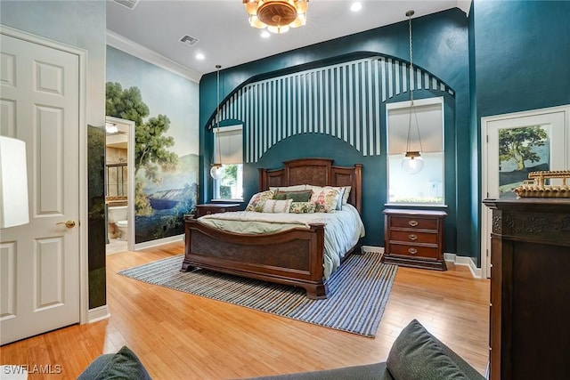 12850 Terabella Way, Fort Myers, FL 33912 - bedroom featuring a towering ceiling, wood finished floors, crown molding, ensuite bathroom, and recessed lighting