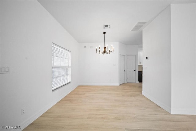 11544 Lake Cypress Loop, Fort Myers, FL 33913 - unfurnished dining area featuring a chandelier and light wood-style floors