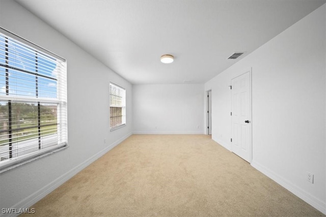 11544 Lake Cypress Loop, Fort Myers, FL 33913 - spare room with light carpet and baseboards