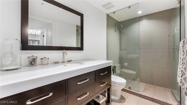 300 Dunes Blvd Unit 404, Naples, FL 34110 - bathroom featuring vanity, a shower stall, and tile patterned floors