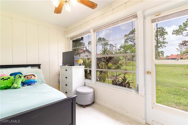 1014 Pine Isle Ln Unit 1014, Naples, FL 34112 - bedroom featuring a decorative wall and ceiling fan