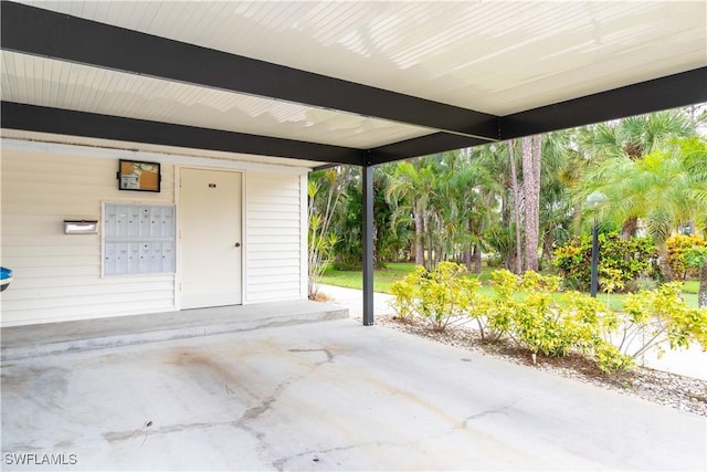 1014 Pine Isle Ln Unit 1014, Naples, FL 34112 - view of patio featuring mail area
