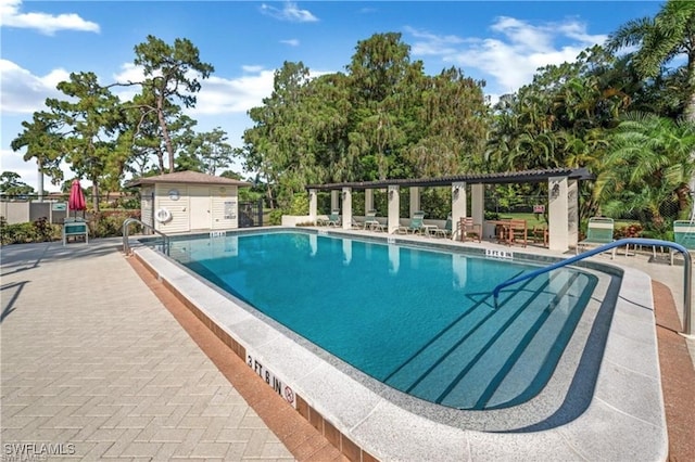 1014 Pine Isle Ln Unit 1014, Naples, FL 34112 - community pool with a patio