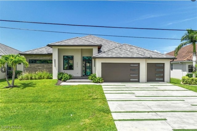 4612 SW 22nd Pl, Cape Coral, FL 33914 - prairie-style house featuring driveway, stucco siding, an attached garage, and a front yard