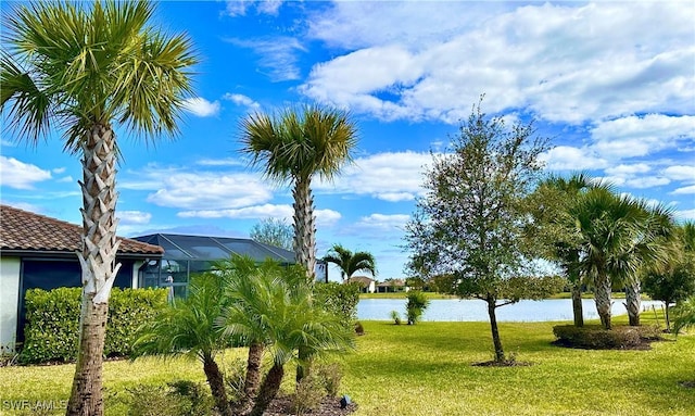 19855 Beverly Park Rd, Estero, FL 33928 - view of green lawn featuring a water view and a lanai