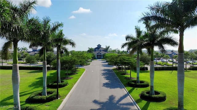 19855 Beverly Park Rd, Estero, FL 33928 - surrounding community featuring a yard