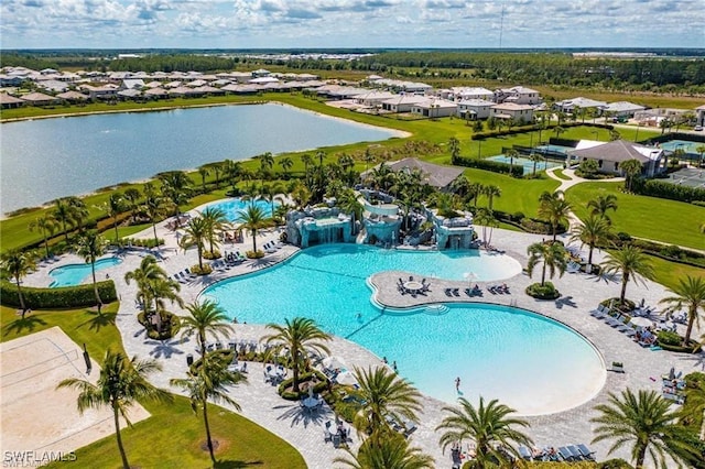 19855 Beverly Park Rd, Estero, FL 33928 - community pool with a water slide, a residential view, and a water view