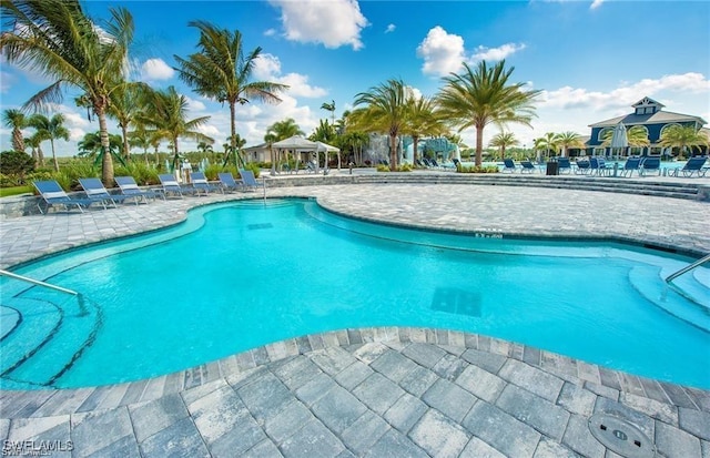 19855 Beverly Park Rd, Estero, FL 33928 - community pool with a patio and a gazebo