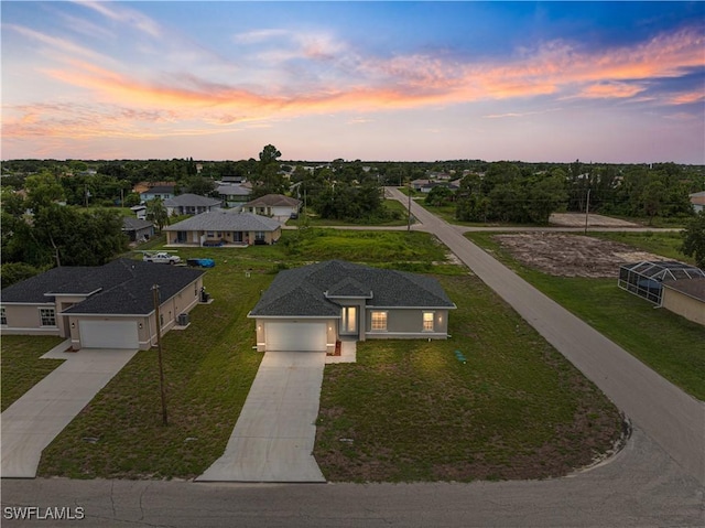 3111 11th St W, Lehigh Acres, FL 33971 - aerial view at dusk