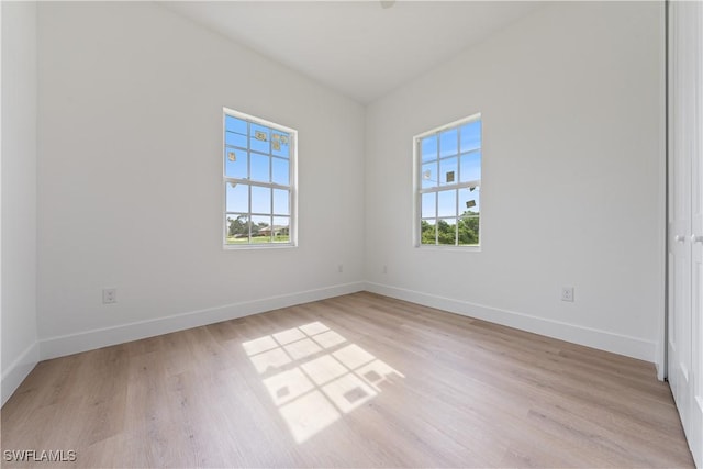 3111 11th St W, Lehigh Acres, FL 33971 - unfurnished room featuring light wood-type flooring and baseboards