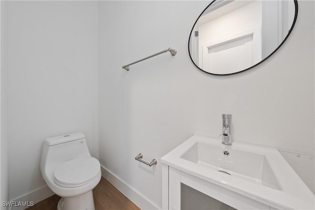 3111 11th St W, Lehigh Acres, FL 33971 - bathroom featuring wood finished floors and vanity