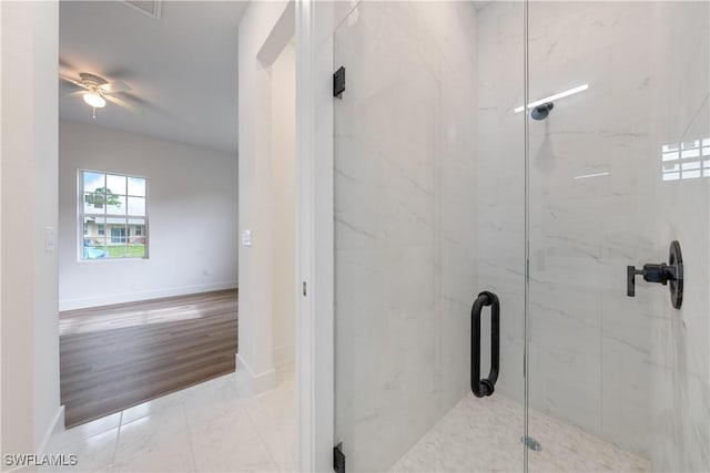 3109 11th St W, Lehigh Acres, FL 33971 - bathroom with a marble finish shower and a ceiling fan