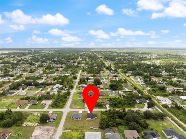 3109 11th St W, Lehigh Acres, FL 33971 - aerial view of property and surrounding area with nearby suburban area