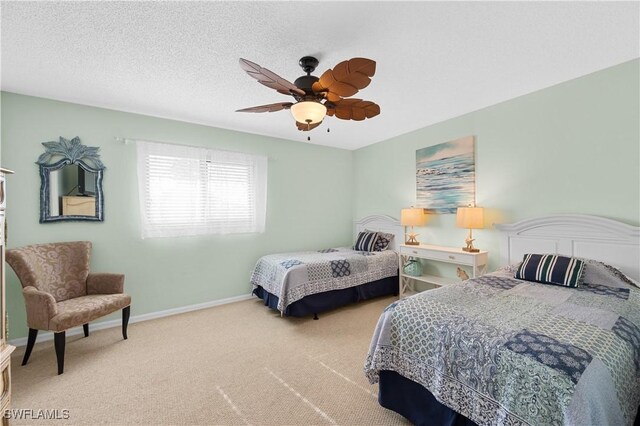 9820 Citadel Ln Unit 202, Bonita Springs, FL 34135 - carpeted bedroom with baseboards and a ceiling fan
