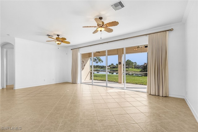 14813 Canton Ct, Naples, FL 34114 - unfurnished room with crown molding, a ceiling fan, light tile patterned flooring, a water view, and arched walkways