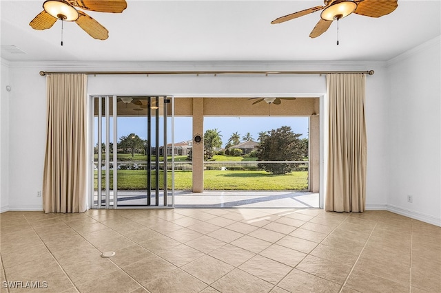14813 Canton Ct, Naples, FL 34114 - tiled spare room with a ceiling fan and ornamental molding