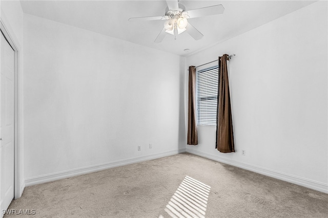 14813 Canton Ct, Naples, FL 34114 - carpeted empty room with a ceiling fan and baseboards