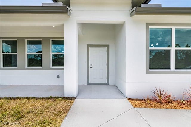 1909 Moore Ave, Lehigh Acres, FL 33972 - entrance to property with stucco siding
