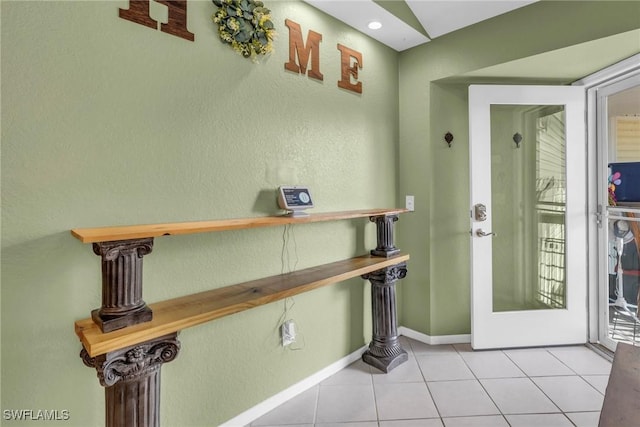 950 Moody Rd Unit 123, North Fort Myers, FL 33903 - tiled entrance foyer featuring a textured wall