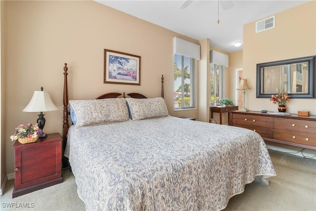 76 4th St Unit 2-102, Bonita Springs, FL 34134 - carpeted bedroom with a ceiling fan