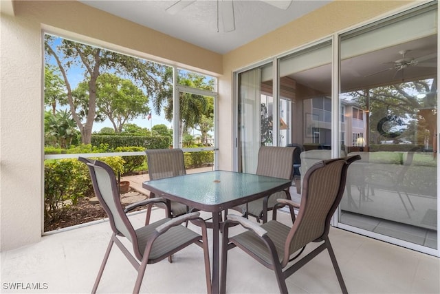 76 4th St Unit 2-102, Bonita Springs, FL 34134 - sunroom with ceiling fan and outdoor dining space