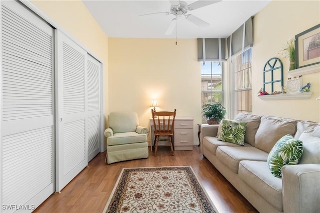76 4th St Unit 2-102, Bonita Springs, FL 34134 - living room with wood finished floors and ceiling fan