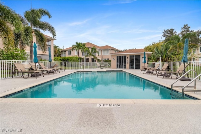 76 4th St Unit 2-102, Bonita Springs, FL 34134 - community pool with a patio