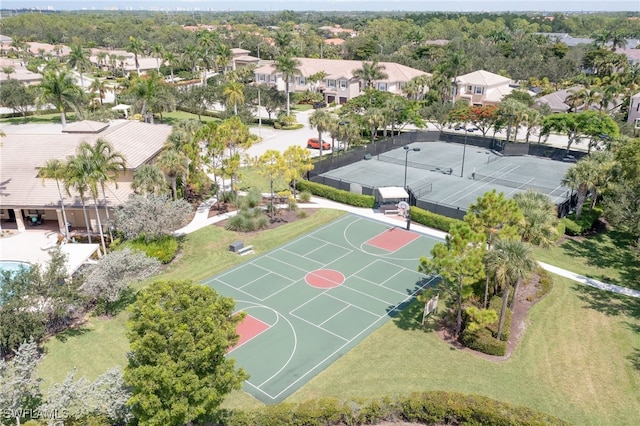 6899 Del Mar Ter, Naples, FL 34105 - view of basketball court featuring community basketball court, a residential view, and a lawn