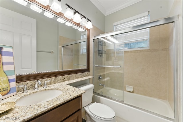 6899 Del Mar Ter, Naples, FL 34105 - bathroom with crown molding, vanity, and shower / bath combination with glass door