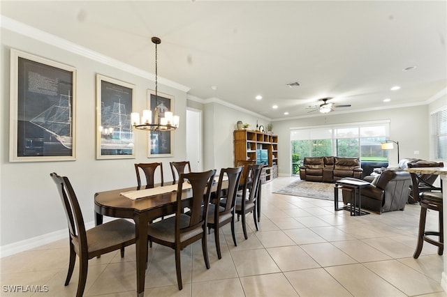6899 Del Mar Ter, Naples, FL 34105 - dining room featuring recessed lighting, plenty of natural light, light tile patterned flooring, a chandelier, and ornamental molding